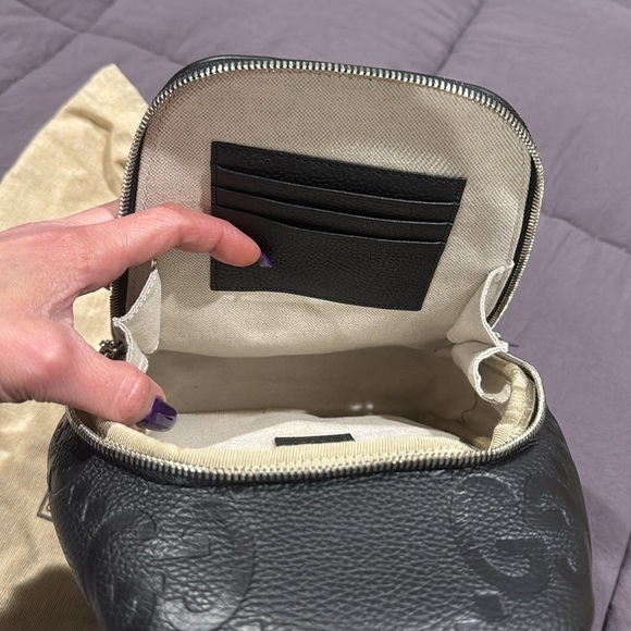 Gucci authentic. Mini jumbo GG crossbody backpack. Never used. - Picture 6 of 7